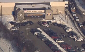 Police and emergency responders at the scene of the Dennis M. Lynch Arena shooting in Pawtucket, Rhode Island, following a domestic violence incident at a high school hockey game.
